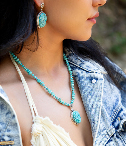 Carved Blue Turquoise and Sterling Silver Pendant