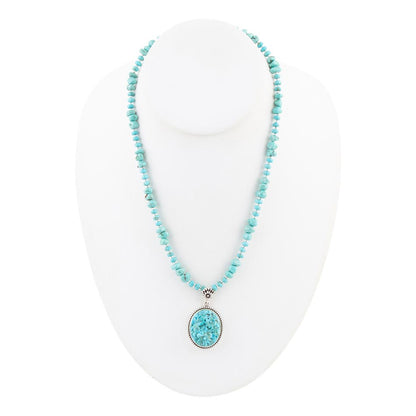 Carved Blue Turquoise and Sterling Silver Pendant