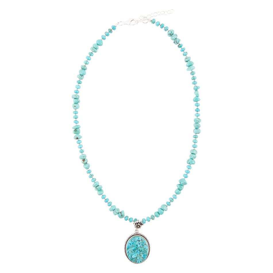 Carved Blue Turquoise and Sterling Silver Pendant