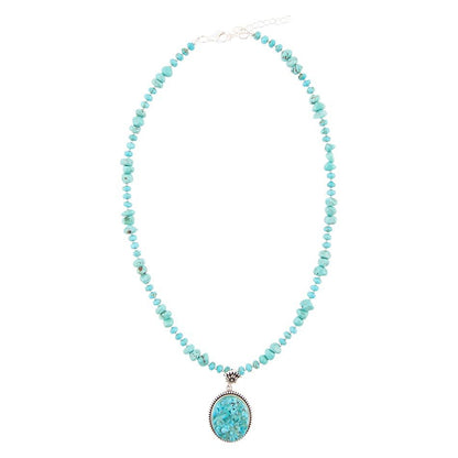 Carved Blue Turquoise and Sterling Silver Pendant